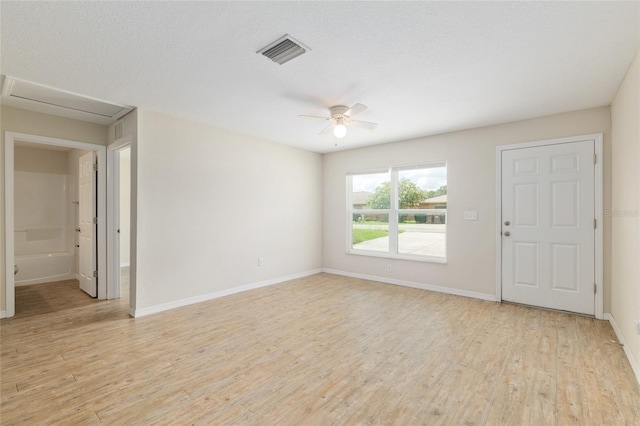 2139 NE 78th Ln, Ocala, FL 34479 - unfurnished room with light wood-type flooring and a ceiling fan