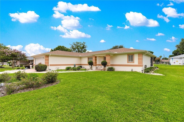 6172 SW 101st Pl, Ocala, FL 34476 - ranch-style house featuring stucco siding, a garage, a front lawn, and concrete driveway