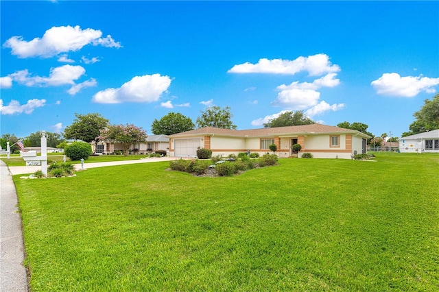 6172 SW 101st Pl, Ocala, FL 34476 - ranch-style house with driveway, an attached garage, a front lawn, and stucco siding