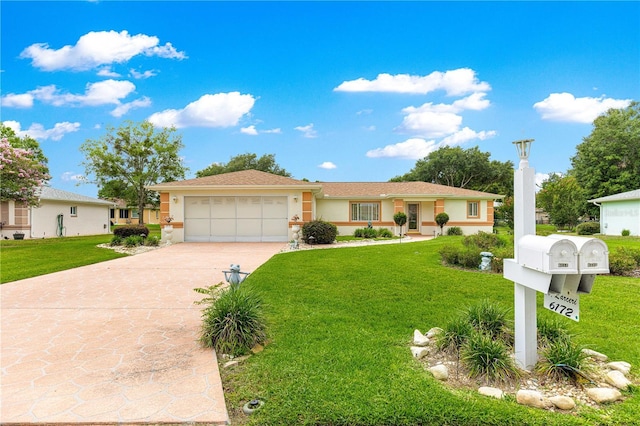6172 SW 101st Pl, Ocala, FL 34476 - ranch-style home with driveway, an attached garage, stucco siding, and a front yard