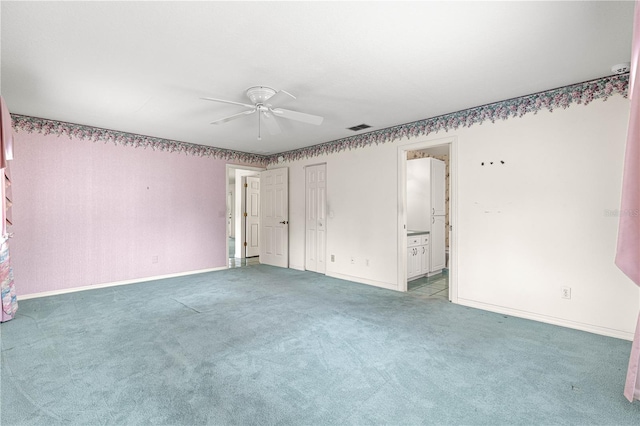 6172 SW 101st Pl, Ocala, FL 34476 - unfurnished bedroom with carpet floors, ceiling fan, and ensuite bathroom