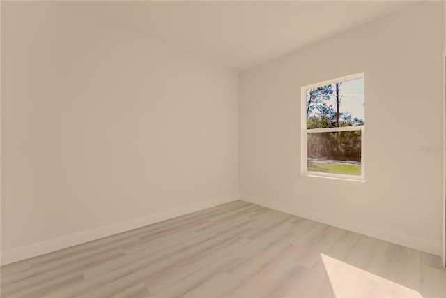 3325 SW 165th Loop, Ocala, FL 34473 - unfurnished room with light wood-style flooring and baseboards