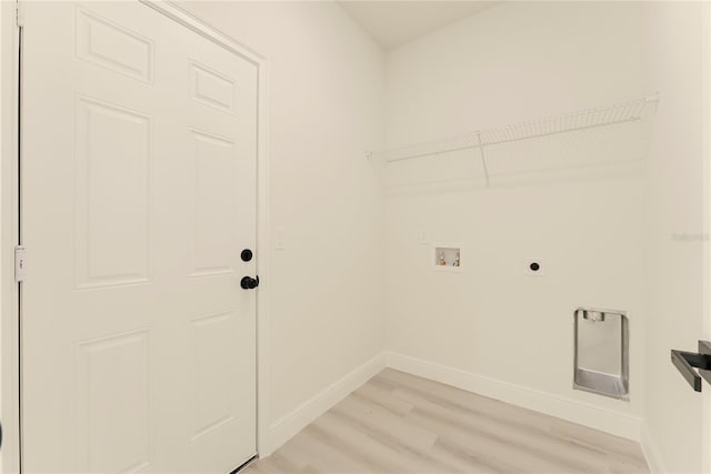 3325 SW 165th Loop, Ocala, FL 34473 - washroom featuring hookup for an electric dryer, light wood finished floors, and washer hookup