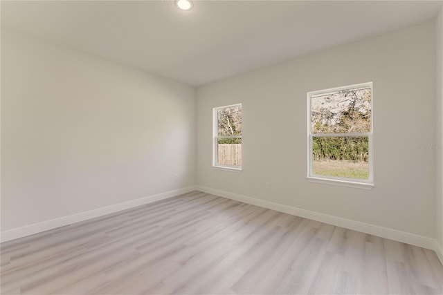 3325 SW 165th Loop, Ocala, FL 34473 - unfurnished room with light wood-type flooring and recessed lighting