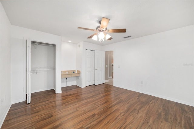 2908 SE 22nd Ave, Ocala, FL 34471 - unfurnished bedroom with two closets, wood finished floors, ceiling fan, and recessed lighting