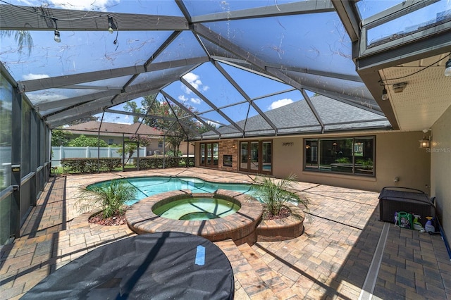 2908 SE 22nd Ave, Ocala, FL 34471 - view of pool featuring a pool with connected hot tub, a patio, and a lanai