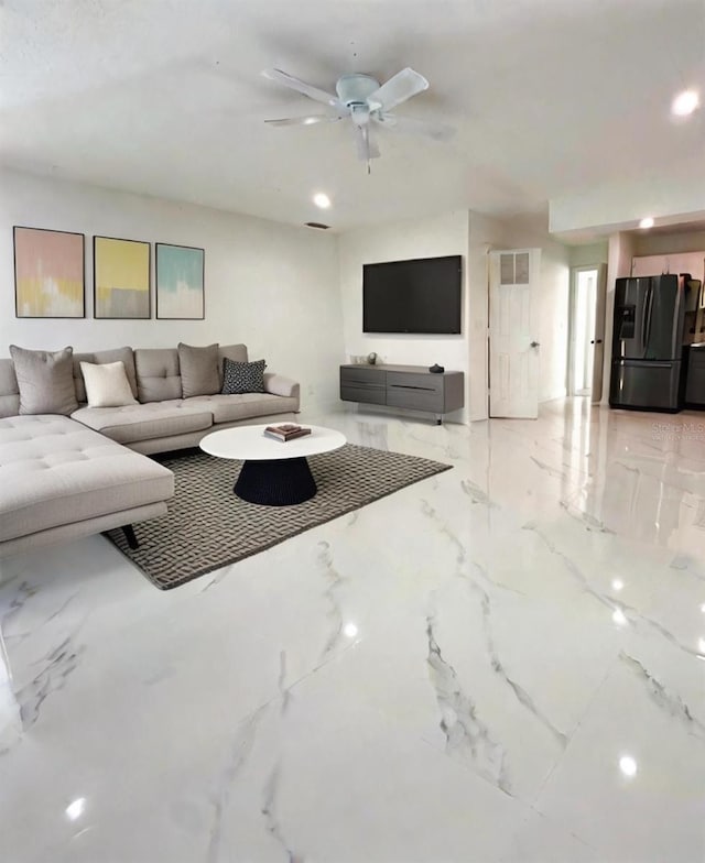 21111 SW Honeysuckle St, Dunnellon, FL 34431 - living area featuring a ceiling fan, light marble finish flooring, and recessed lighting