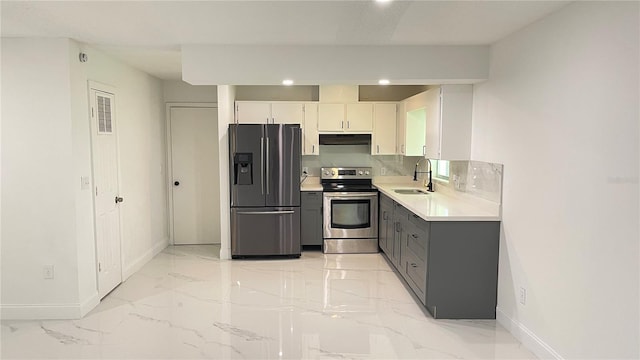 21111 SW Honeysuckle St, Dunnellon, FL 34431 - kitchen with refrigerator with ice dispenser, stainless steel range with electric cooktop, extractor fan, light marble finish flooring, and light countertops