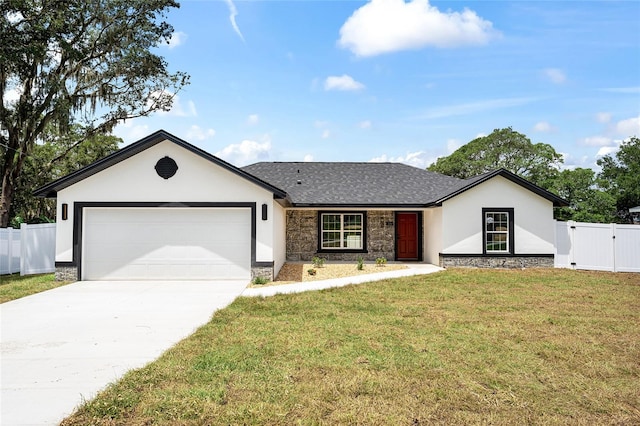 36 Pine Radl, Ocala, FL 34472 - view of front of house with a garage, stucco siding, driveway, stone siding, and a gate