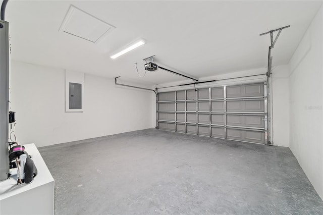 82 Bay Rd, Ocklawaha, FL 32179 - garage featuring a garage door opener and electric panel