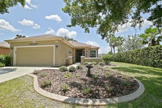 13170 SE 92nd Court Rd, Summerfield, FL 34491 - view of front of home with stucco siding, an attached garage, and driveway