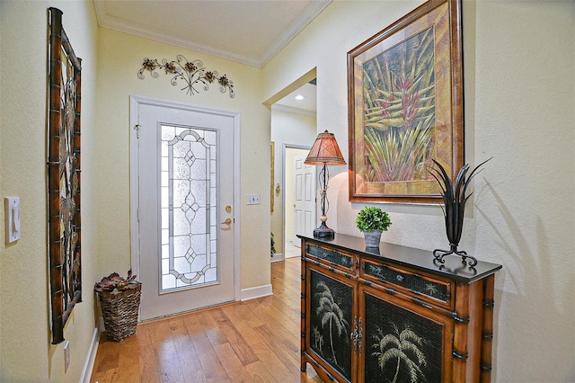 13170 SE 92nd Court Rd, Summerfield, FL 34491 - foyer featuring crown molding and light wood finished floors