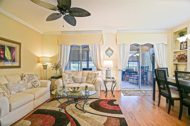 13170 SE 92nd Court Rd, Summerfield, FL 34491 - living room with ornamental molding, hardwood / wood-style floors, and a ceiling fan