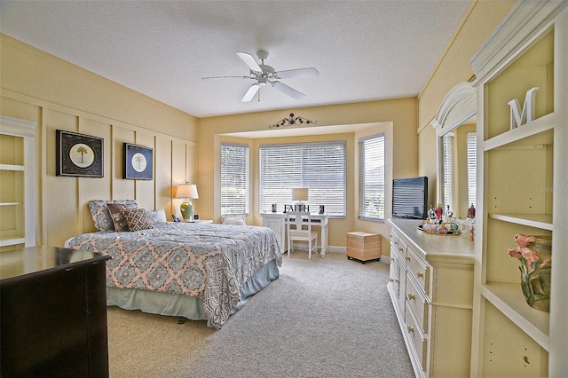 13170 SE 92nd Court Rd, Summerfield, FL 34491 - bedroom featuring carpet, a textured ceiling, and ceiling fan