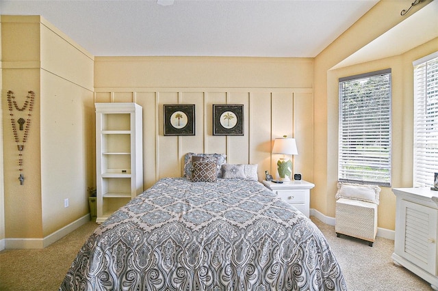 13170 SE 92nd Court Rd, Summerfield, FL 34491 - bedroom with light carpet and baseboards