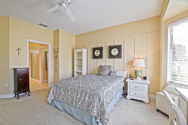 13170 SE 92nd Court Rd, Summerfield, FL 34491 - bedroom with light carpet and ceiling fan
