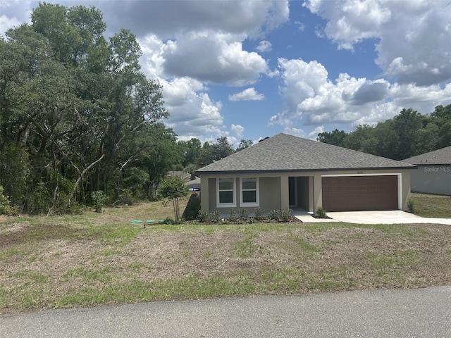 2850 W Camilo Dr, Citrus Springs, FL 34434 - view of front of property featuring stucco siding, an attached garage, concrete driveway, a shingled roof, and a front yard