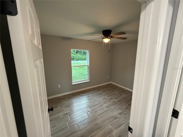 5 Laurel Pass Ln, Ocala, FL 34472 - spare room featuring ceiling fan and wood tiled floors