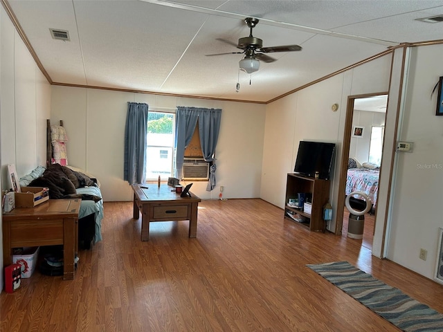 5862 SW 160th Ct, Ocala, FL 34481 - living room featuring ornamental molding, wood finished floors, ceiling fan, lofted ceiling, and cooling unit