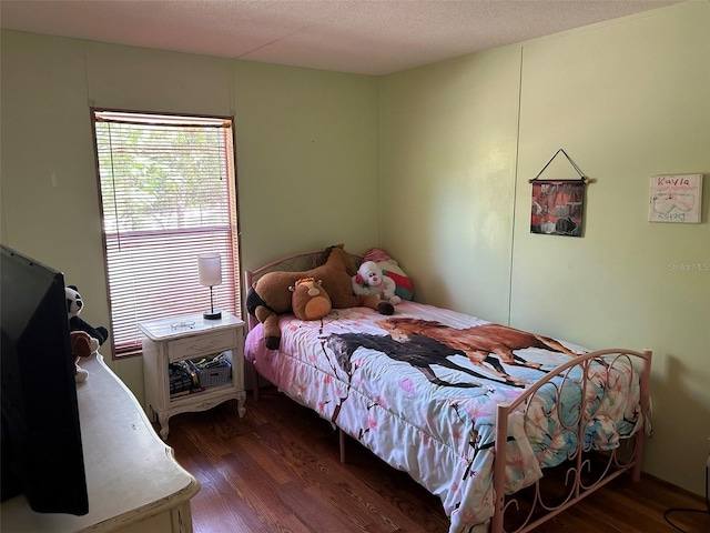 5862 SW 160th Ct, Ocala, FL 34481 - bedroom with dark wood-style flooring