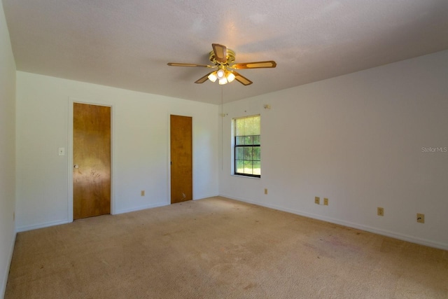 205 NE 53rd St, Ocala, FL 34479 - unfurnished room featuring light carpet and ceiling fan