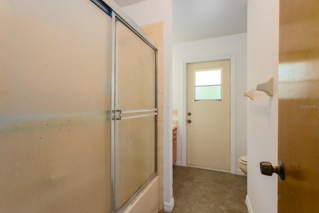 205 NE 53rd St, Ocala, FL 34479 - full bathroom featuring vanity and shower / bath combination with glass door