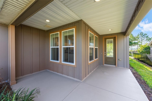 4970 NW 35th Lane Rd, Ocala, FL 34482 - entrance to property featuring board and batten siding and a patio