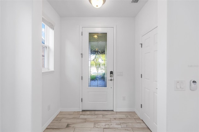 4970 NW 35th Lane Rd, Ocala, FL 34482 - entryway with wood finish floors and baseboards