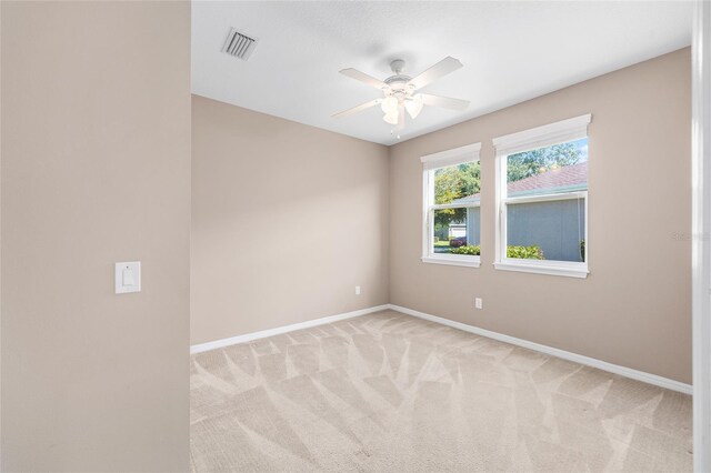4970 NW 35th Lane Rd, Ocala, FL 34482 - empty room featuring light colored carpet and a ceiling fan