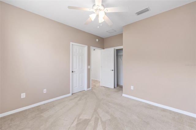 4970 NW 35th Lane Rd, Ocala, FL 34482 - unfurnished bedroom featuring light carpet, a closet, and a ceiling fan