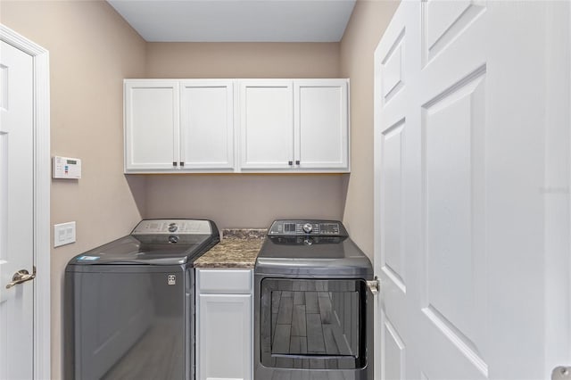4970 NW 35th Lane Rd, Ocala, FL 34482 - laundry room featuring cabinet space and separate washer and dryer