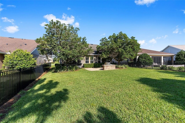 4970 NW 35th Lane Rd, Ocala, FL 34482 - fenced backyard featuring a fireplace