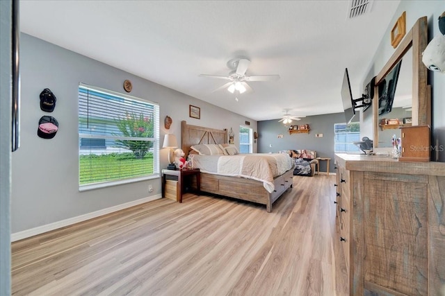 5459 SW 86th St, Ocala, FL 34476 - bedroom with light wood-type flooring and a ceiling fan