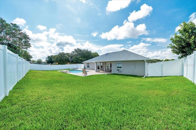 5459 SW 86th St, Ocala, FL 34476 - rear view of property featuring a patio, a fenced backyard, stucco siding, and a gate