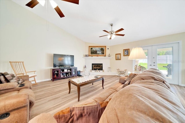 5459 SW 86th St, Ocala, FL 34476 - living area with a ceiling fan, light wood-style floors, french doors, and vaulted ceiling