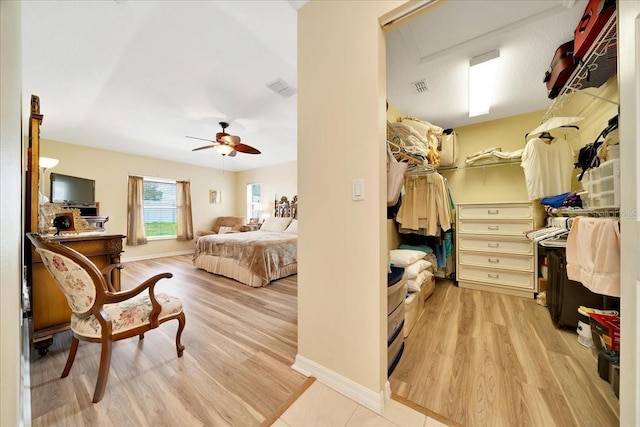 5459 SW 86th St, Ocala, FL 34476 - bedroom featuring light wood finished floors and ceiling fan