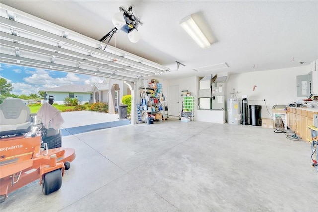 5459 SW 86th St, Ocala, FL 34476 - garage with heating unit, water heater, and a garage door opener