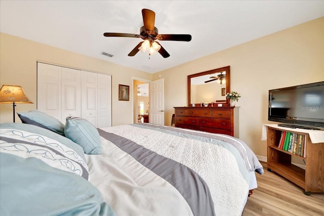 5459 SW 86th St, Ocala, FL 34476 - bedroom with light wood-type flooring, a closet, and ceiling fan