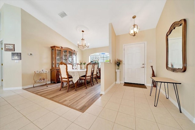 5459 SW 86th St, Ocala, FL 34476 - foyer entrance with a chandelier, light tile patterned floors, and lofted ceiling