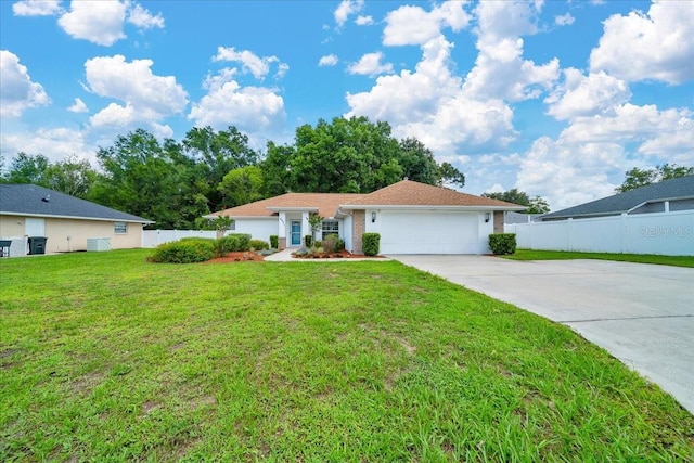 6631 SE 11th Loop, Ocala, FL 34472 - single story home with driveway and a garage