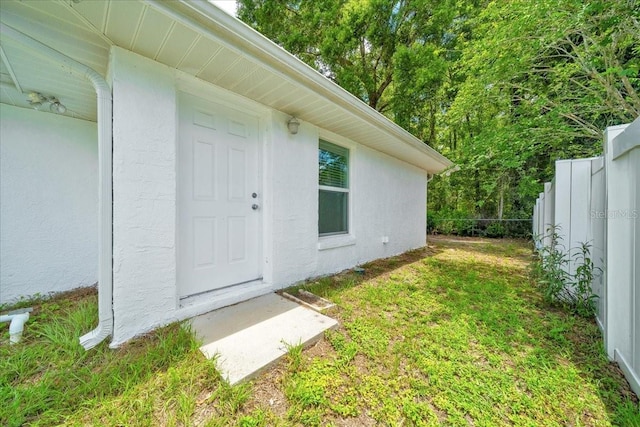 6631 SE 11th Loop, Ocala, FL 34472 - property entrance featuring stucco siding