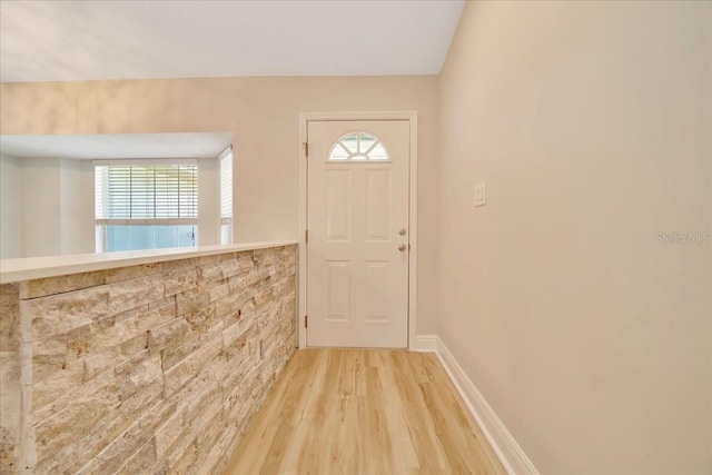 6631 SE 11th Loop, Ocala, FL 34472 - entryway featuring wood finished floors and baseboards
