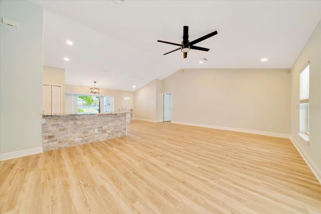 6631 SE 11th Loop, Ocala, FL 34472 - unfurnished living room with plenty of natural light, light wood-style flooring, a ceiling fan, recessed lighting, and vaulted ceiling