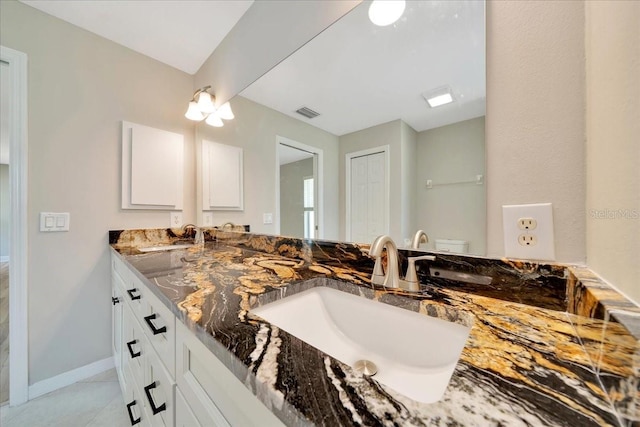 6631 SE 11th Loop, Ocala, FL 34472 - bathroom with double vanity and tile patterned floors