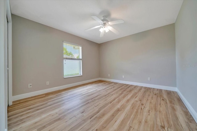 6631 SE 11th Loop, Ocala, FL 34472 - spare room featuring light wood-style floors and a ceiling fan