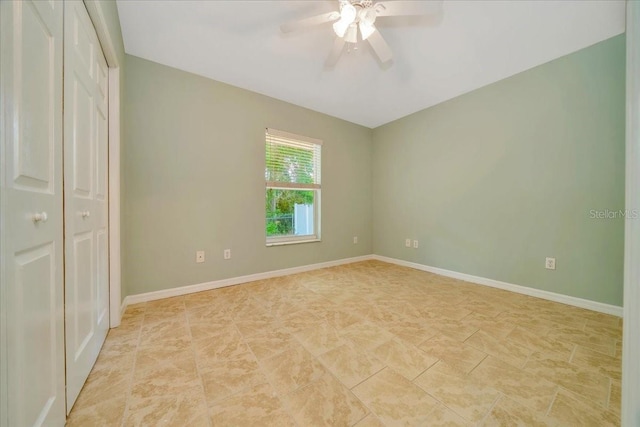 6631 SE 11th Loop, Ocala, FL 34472 - unfurnished bedroom featuring ceiling fan and a closet