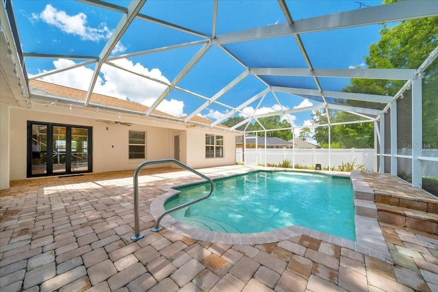 6631 SE 11th Loop, Ocala, FL 34472 - view of swimming pool with a patio area, ceiling fan, glass enclosure, and french doors
