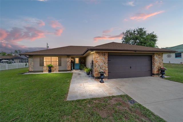 501 Marion Oaks Dr, Ocala, FL 34473 - view of front facade with driveway, a garage, stone siding, and stucco siding