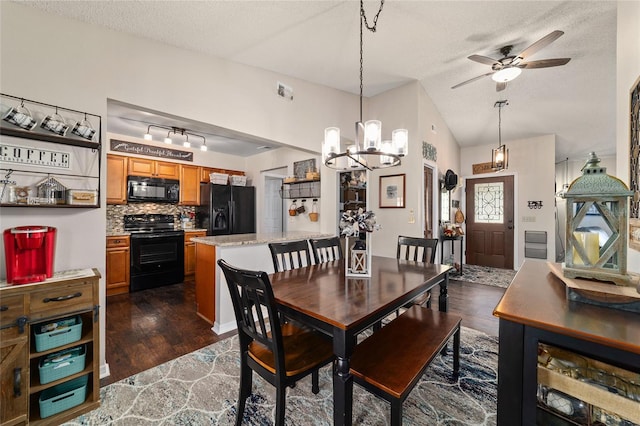 501 Marion Oaks Dr, Ocala, FL 34473 - dining space with a chandelier, a textured ceiling, a ceiling fan, lofted ceiling, and dark wood-style flooring