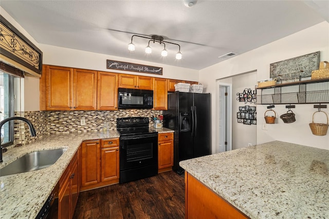 501 Marion Oaks Dr, Ocala, FL 34473 - kitchen featuring black appliances, light stone counters, tasteful backsplash, and dark wood-style flooring